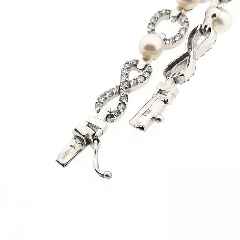 Afbeelding 4 van Witgouden infinityschakel armband met parel en zirconia | 19,5 cm