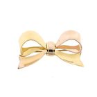 Image 1 of Vintage two-tone gold brooch as a bow