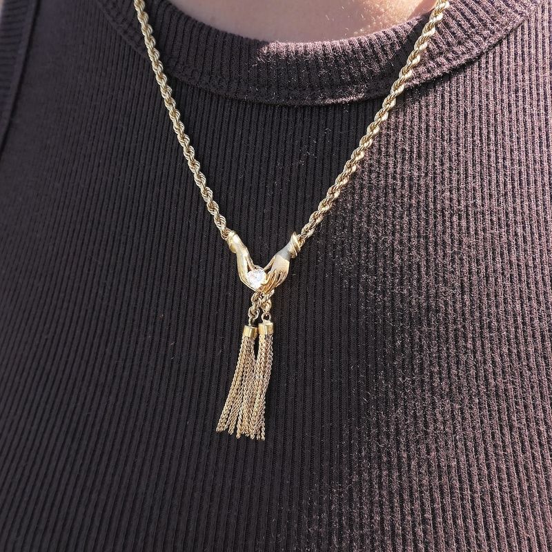 Image 12 of Gold twisted link chain with tassels and zirconia