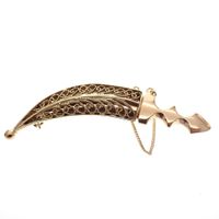 Gold brooch of an Arab dagger; Filigree