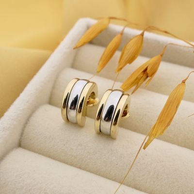 Image 2 of Paul Simons two-tone gold earrings; Half-round