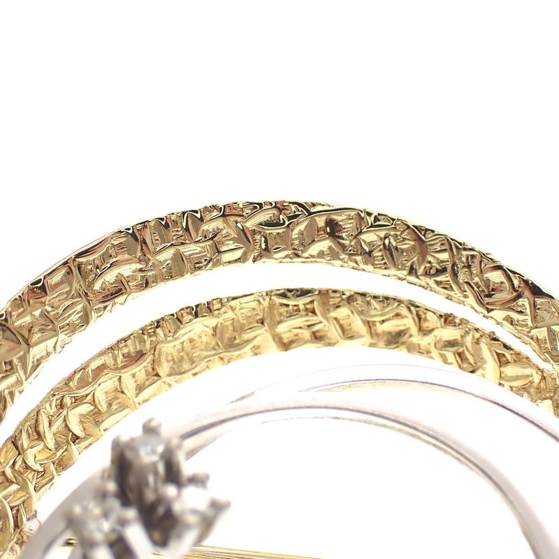 Image 4 of Two-tone gold brooch with 0.06 ct diamond.