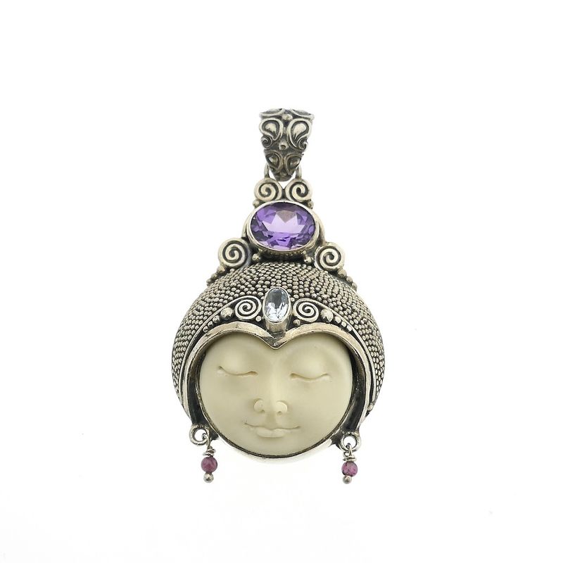 Image 1 of Silver pendant with the face of a sleeping moon