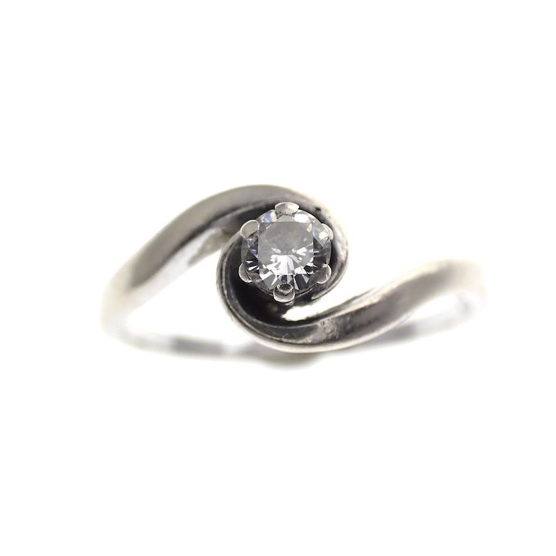 Image 2 of Two-tone gold solitaire ring with 0.15 ct diamond.