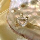 Image 2 of Gold pendant of a heart with arrow