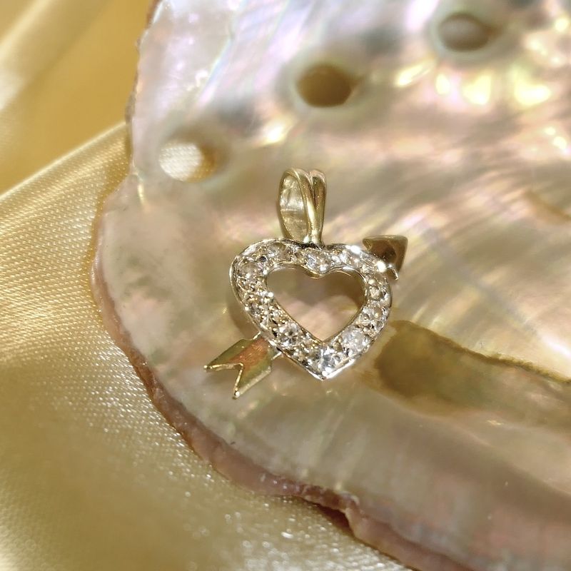 Image 2 of Gold pendant of a heart with arrow