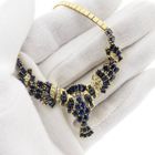 Image 7 of Golden omega link necklace with sapphires and diamonds; 0.34 ct.