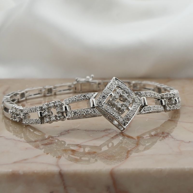 Image 10 of White gold link bracelet with 1.40 ct diamond.