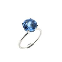 White gold solitaire ring with topaz