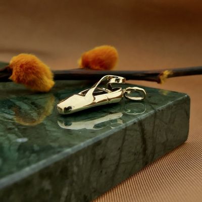 Image 2 of Gold pendant of a ballet shoe