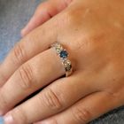 Image 10 of White gold solitaire ring with white and blue diamonds; 0.74 ct.