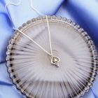 Image 2 of White gold pendant with 0.04 ct diamond.