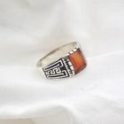 Image 8 of Silver ring with orange zirconia and Maori pattern