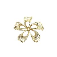 Golden flower brooch