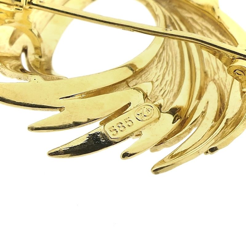 Image 4 of Golden brooch of wings