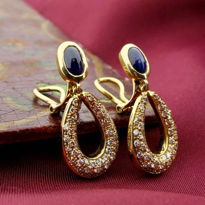 Gold clip-on earrings with sapphires and diamonds; Approx. 1.00 ct. Image 2 of Gold clip-on earrings with sapphires and diamonds; Approx. 1.00 ct.