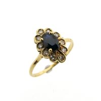 18 carat gold entourage ring with sapphire and diamond
