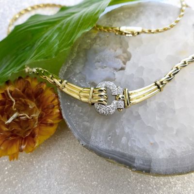 Two-tone gold necklace with 0.26 ct diamond pendant. Image 2 of Two-tone gold necklace with 0.26 ct diamond pendant.