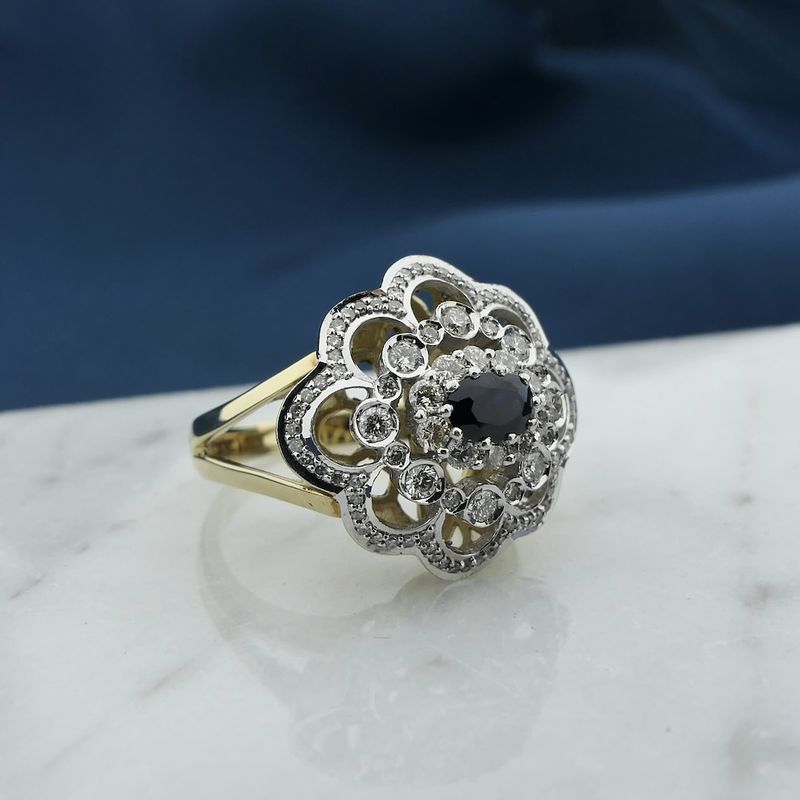 Image 7 of Gold entourage ring with sapphire and diamonds; approx. 0.51 ct.