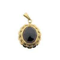 Vintage gold pendant with garnet