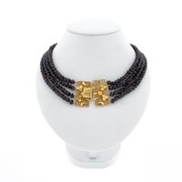 Antique beaded necklace with gold decorative clasp