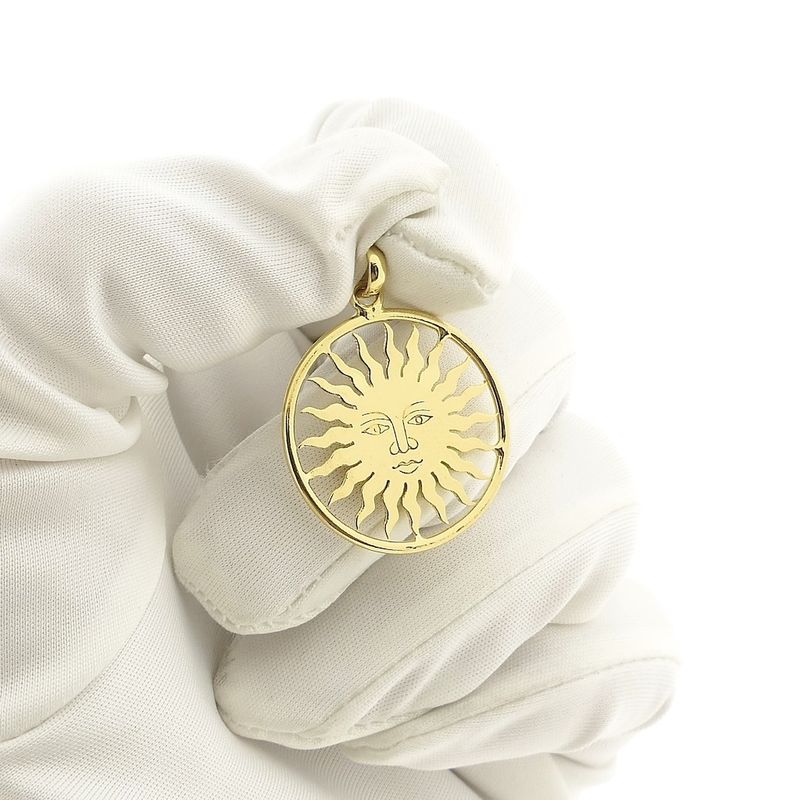 Image 6 of 18-karat gold pendant of a sun with a face | St. Moritz