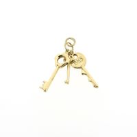 Gold pendant from a bunch of keys