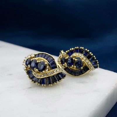 Image 2 of Gold earrings with sapphires and diamonds; 0.20 ct.