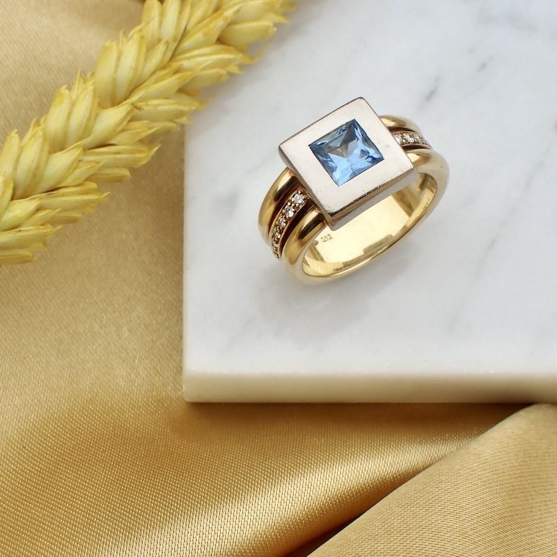 Image 2 of Two-tone gold ring with topaz and diamonds; 0.12 ct.