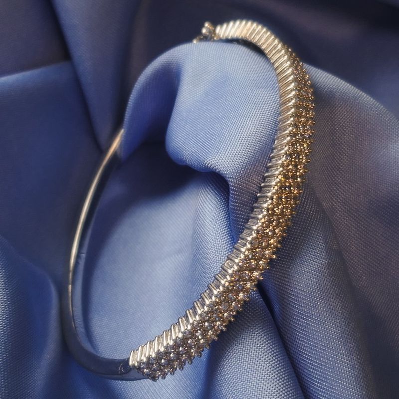 Image 9 of White gold bangle with a cluster of zirconia; Size M/L