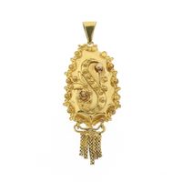 Antique gold pendant of a hat bell