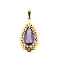 Gold Pendant with Synthetic Purple Gemstone