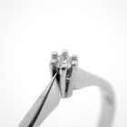 Image 3 of White gold solitaire ring with 0.04 ct diamond.