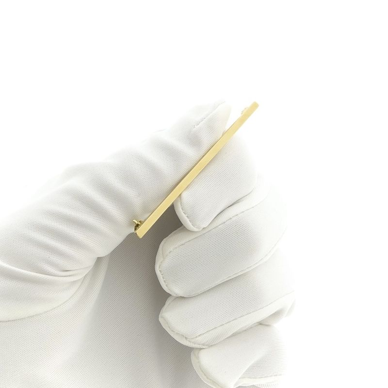 Image 1 of Golden narrow brooch