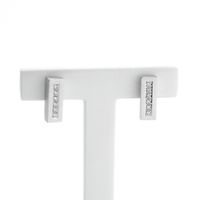 Gold stud earrings set with diamonds; 0.12 ct.