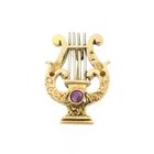 Image 1 of Gold brooch of a lyre harp with ruby
