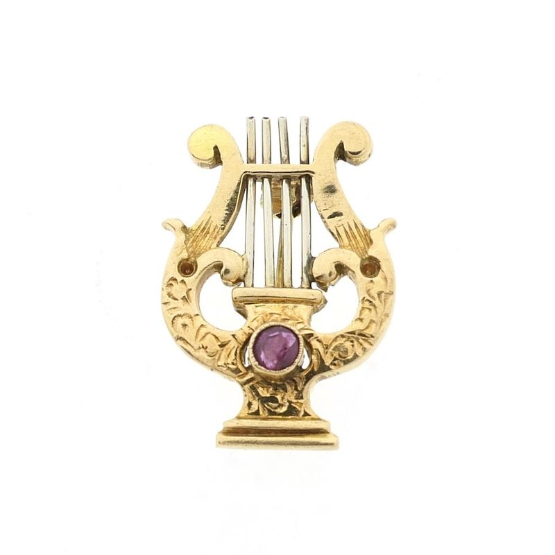 Image 1 of Gold brooch of a lyre harp with ruby