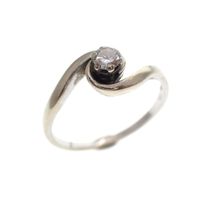 Two-tone gold solitaire ring with 0.15 ct diamond.