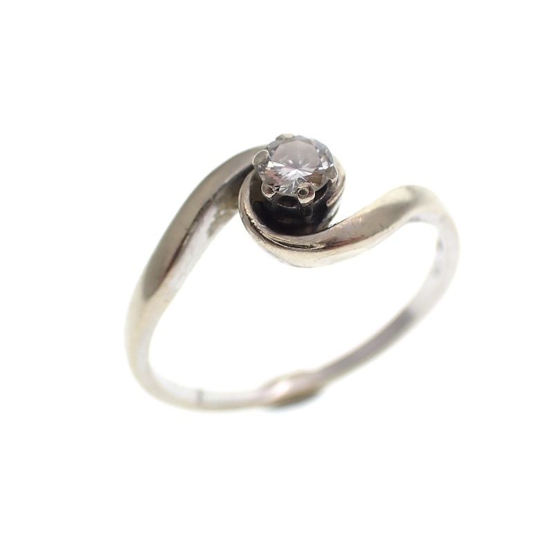 Image 1 of Two-tone gold solitaire ring with 0.15 ct diamond.