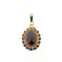 Vintage gold entourage pendant with garnet