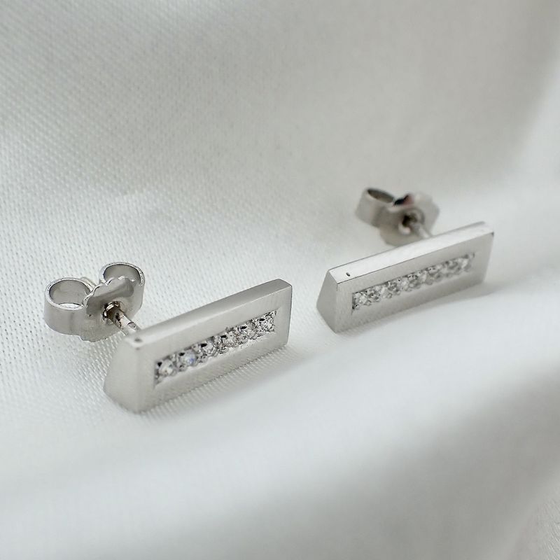 Image 2 of Gold stud earrings set with diamonds; 0.12 ct.