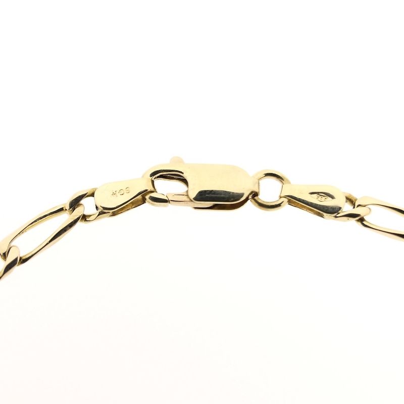 Image 3 of Gold closed Figaro link bracelet.
