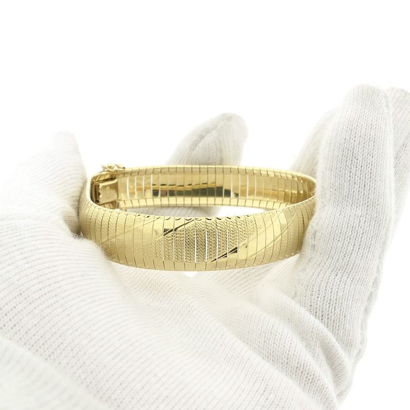 Image 8 of Gold omega link bracelet.
