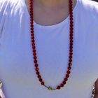 Image 9 of Carnelian bead necklace with gold clasp.