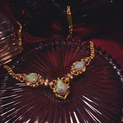 Image 2 of 18-karat gold necklace with a fixed pendant; Opal and diamond 0.46 ct. | 43 cm