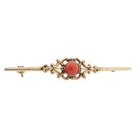 Vintage gold brooch with blood coral; filigree technique