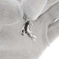 Silver charm; Old shoe