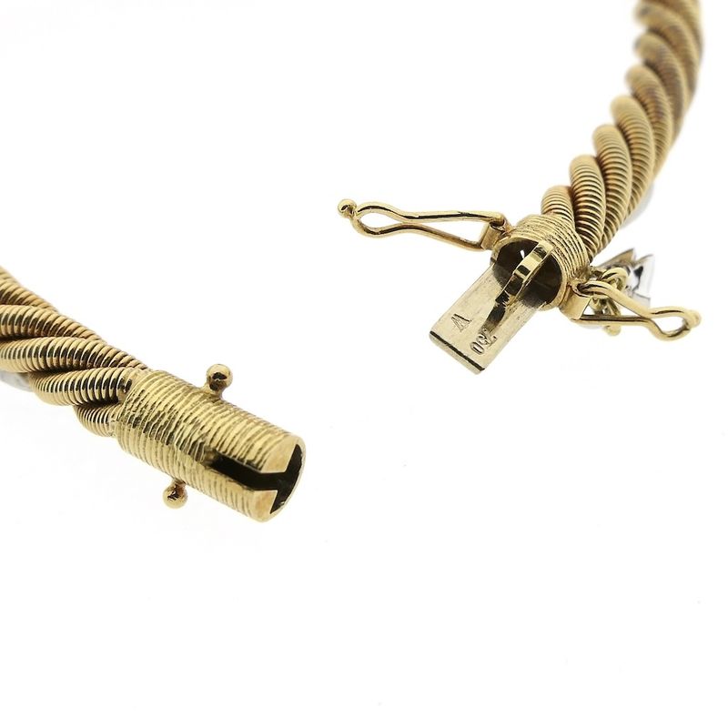 Image 9 of 18-karat gold twisted bracelet with sapphire and diamond; 1.11 ct. | Wellendorff