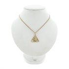 Image 5 of Gold pendant of the naturist symbol