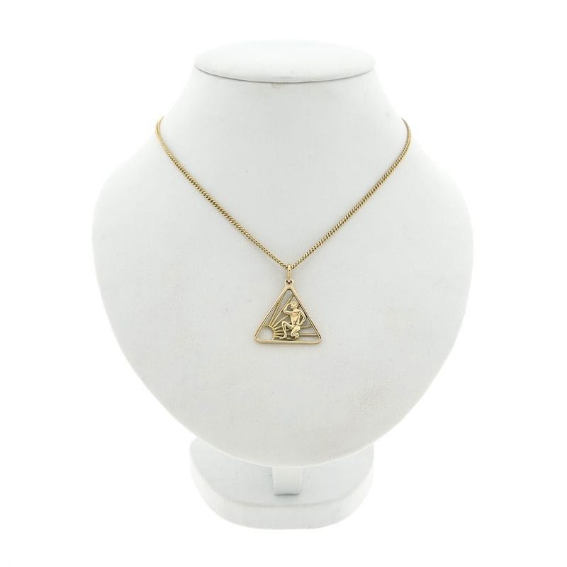 Image 5 of Gold pendant of the naturist symbol